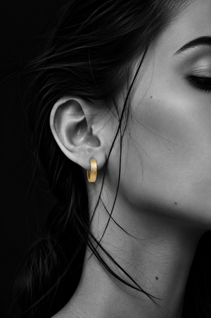 Finely hammered creole earrings