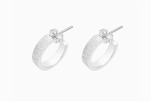 Finely hammered creole earrings